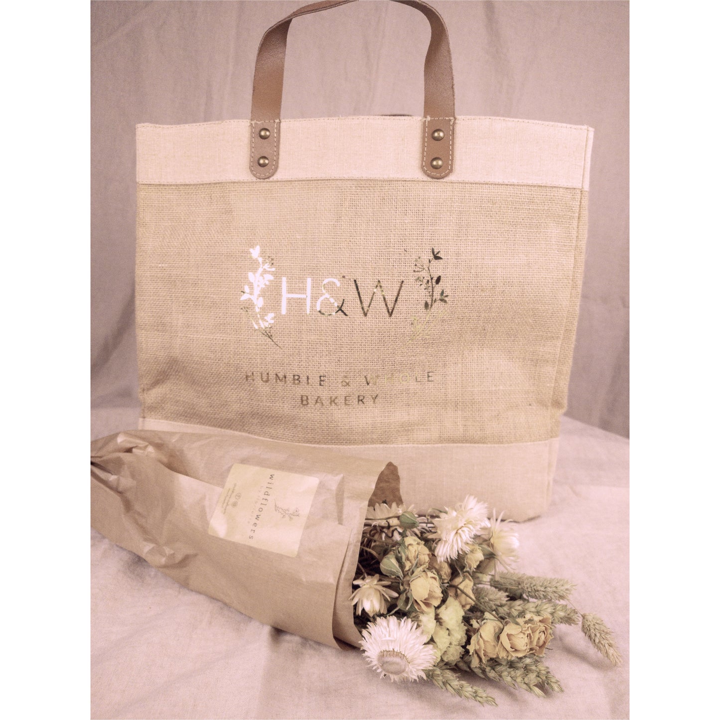 Hessian shopping bag with leather handles.